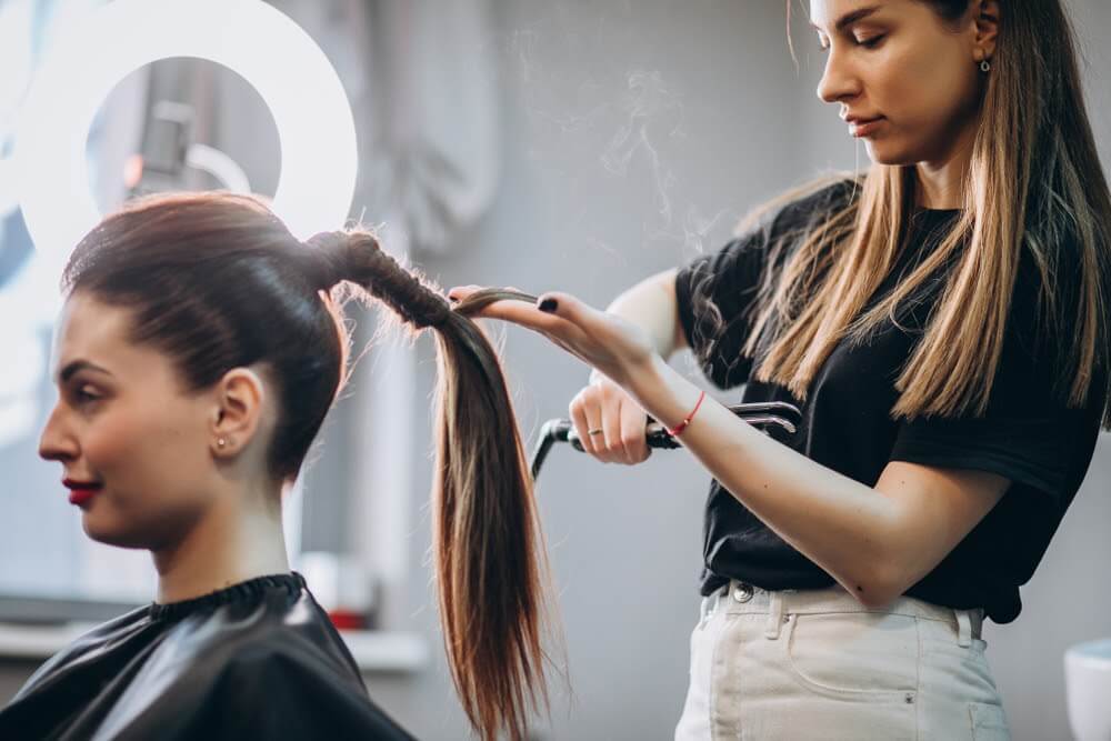Woman styling hair